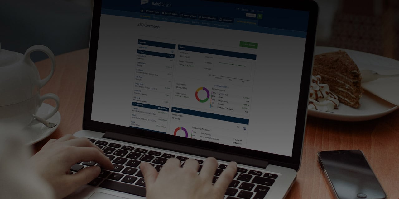 Individual looking at Nexus Online on their laptop
