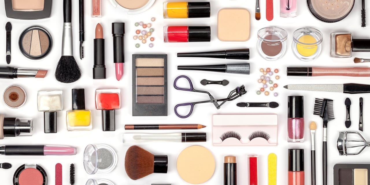 Beauty products and tools in a white background